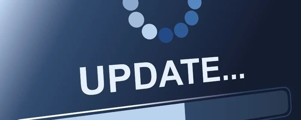 „Update” felirat betöltési sávval — a weboldal frissítésének illusztrációja